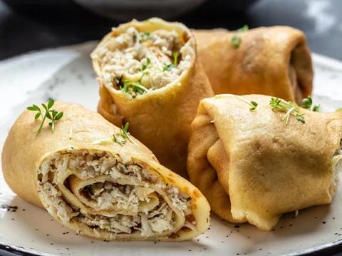 Crêpes roulées poulet, champignons, béchamel